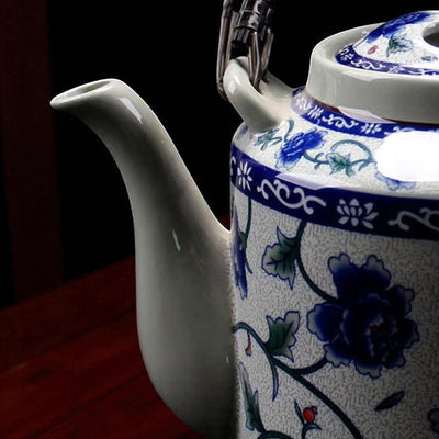 Ancienne théière en porcelaine bleu