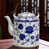 Ancienne théière en porcelaine bleu