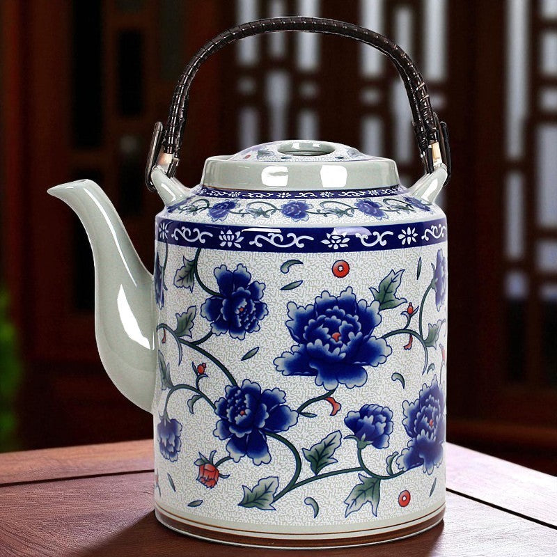 Ancienne théière en porcelaine bleu