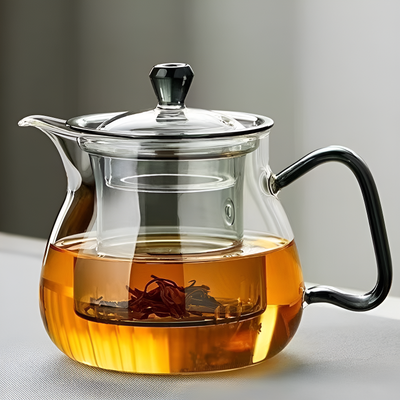Belle théière en verre