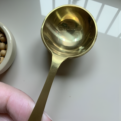 Cuillère doseuse à thé