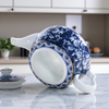 Jolie théière bleue fleur blanche
