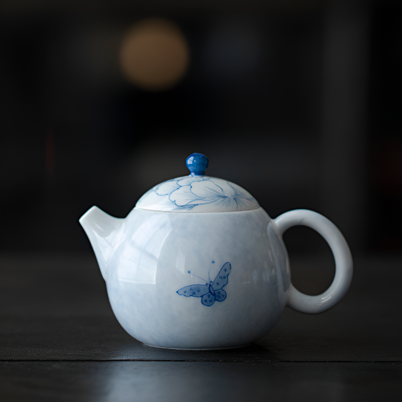 Jolie théière porcelaine