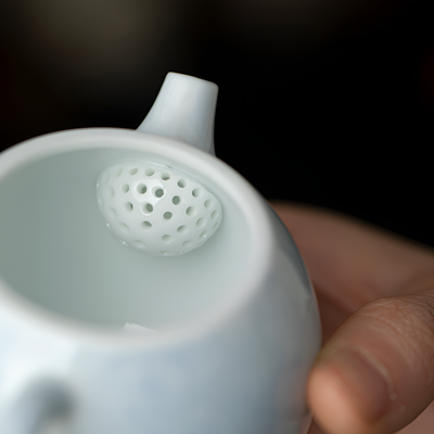 Jolie théière porcelaine