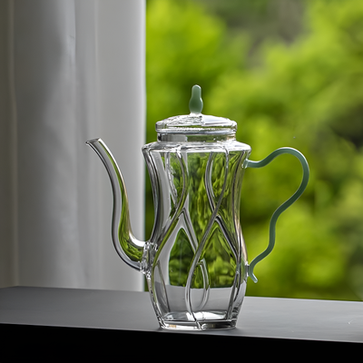 Petite théière individuelle en verre