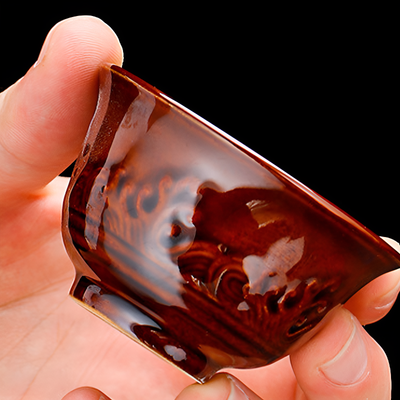 Service à thé chinois doré et marron motif relief