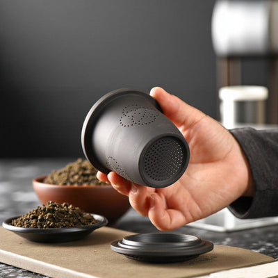 Tasse à thé avec infuseur terre cuite