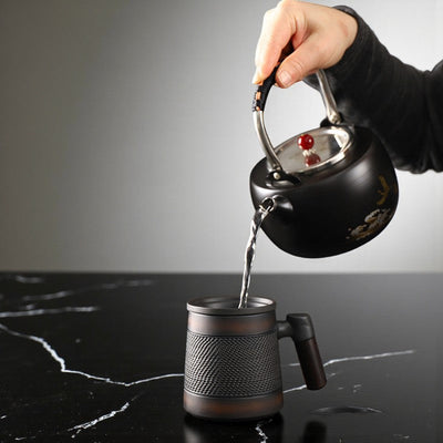 Tasse à thé avec infuseur terre cuite