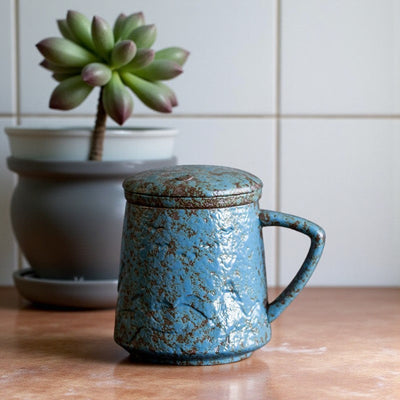 Tasse à thé vintage avec infuseur