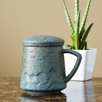 Tasse à thé vintage avec infuseur