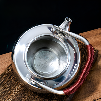 Théière ancienne inox