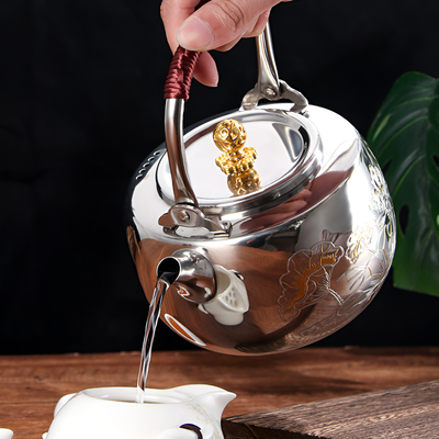 Théière ancienne inox