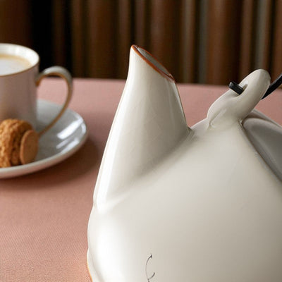 Théière ancienne porcelaine fond blanc