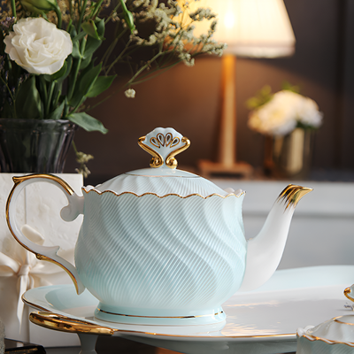 Théière anglaise finition dorée