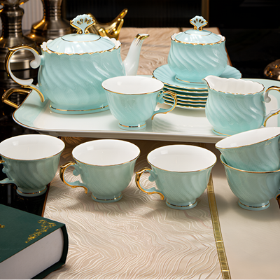 Théière anglaise finition dorée