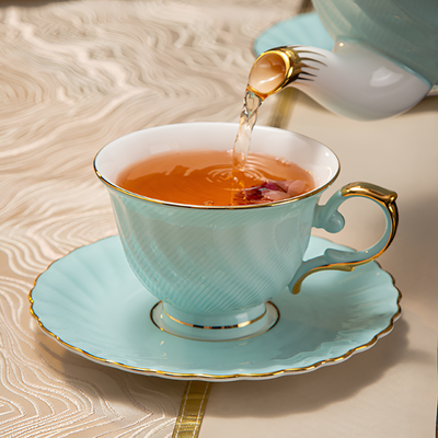 Théière anglaise finition dorée