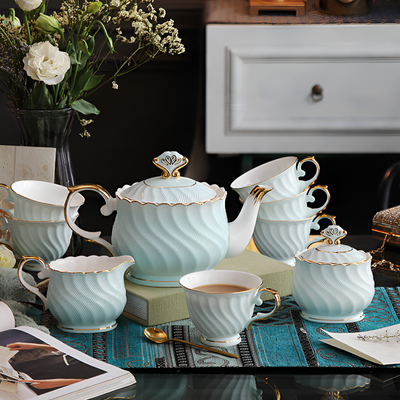 Théière anglaise finition dorée