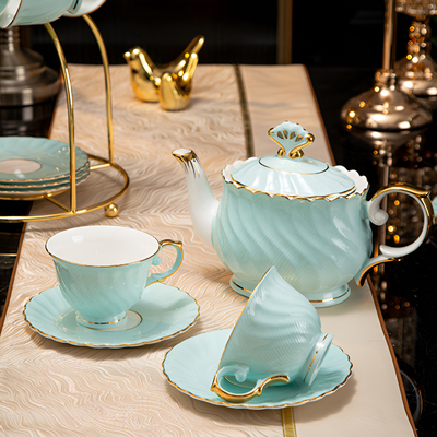 Théière anglaise finition dorée