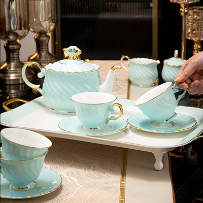 Théière anglaise finition dorée