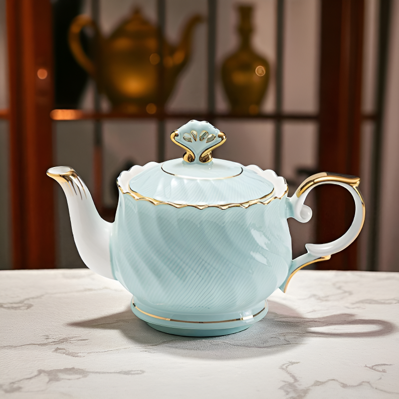 Théière anglaise finition dorée