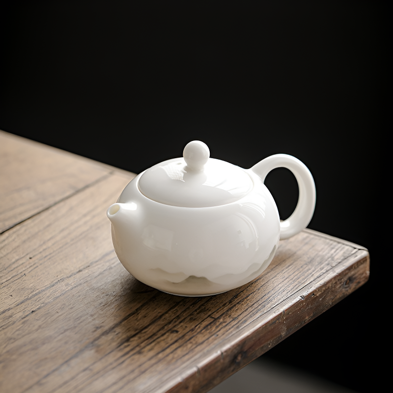 Théière blanche jolie