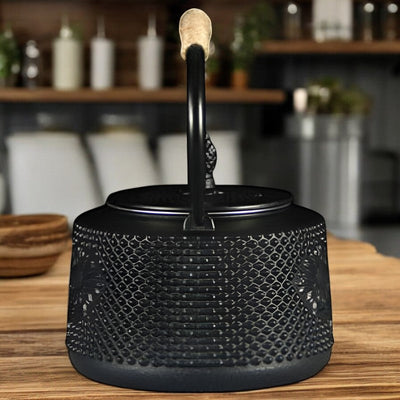 Théière en fonte avec filtre pour le thé