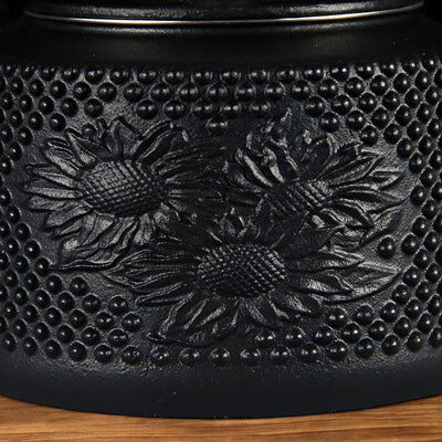 Théière en fonte avec filtre pour le thé