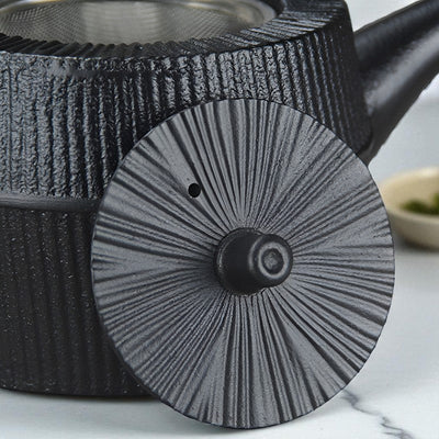 Théière en fonte induction