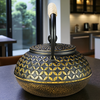 Théière en fonte noir et doré