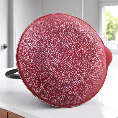 Théière en fonte rouge