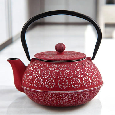 Théière en fonte rouge