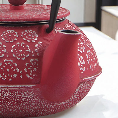 Théière en fonte rouge
