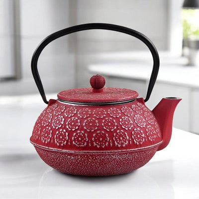 Théière en fonte rouge