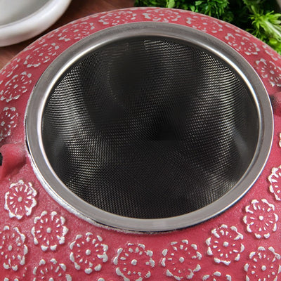 Théière en fonte rouge