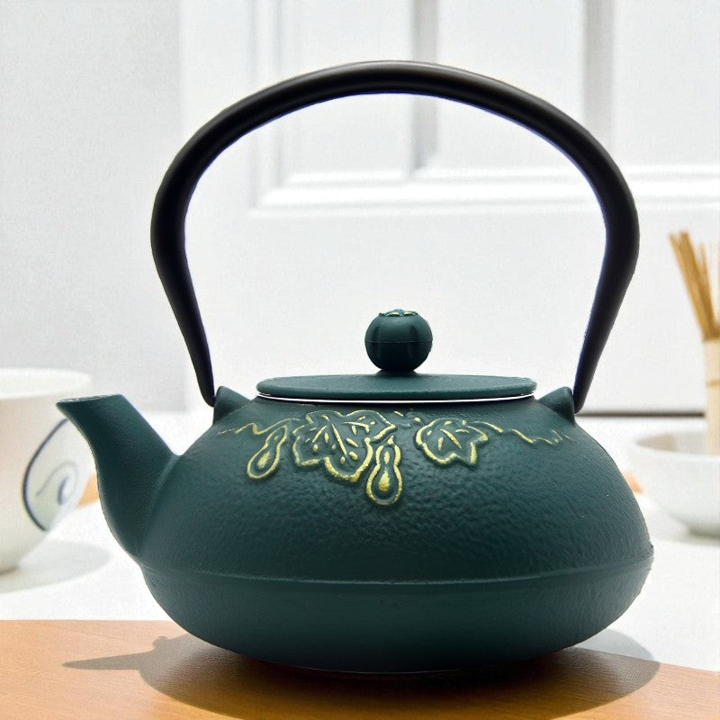 Théière en fonte vert foncé