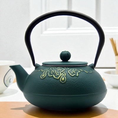 Théière en fonte vert foncé