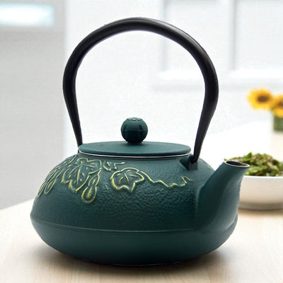 Théière en fonte vert foncé