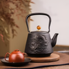 Théière en fonte vintage