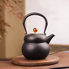 Théière en fonte vintage