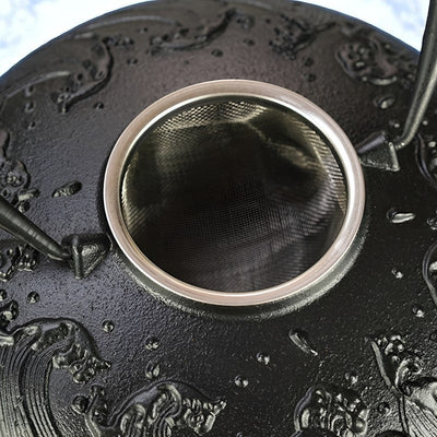 Théière plate en fonte