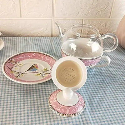 Théière porcelaine avec tasse