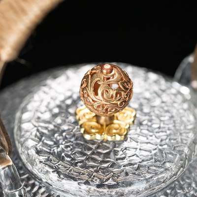 Théière transparente avec motif