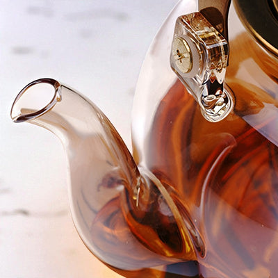 Théière en verre et doré