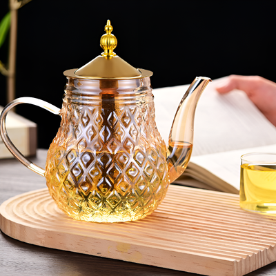 Théière en verre avec filtre et piston