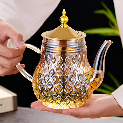 Théière en verre avec filtre et piston