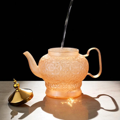 Théière en verre avec filtre et piston